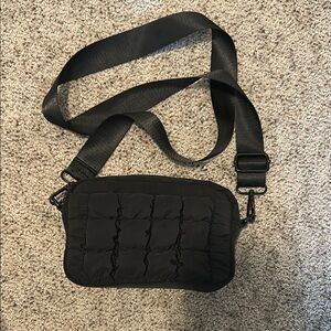 Sol and Selene black puffy camera bag